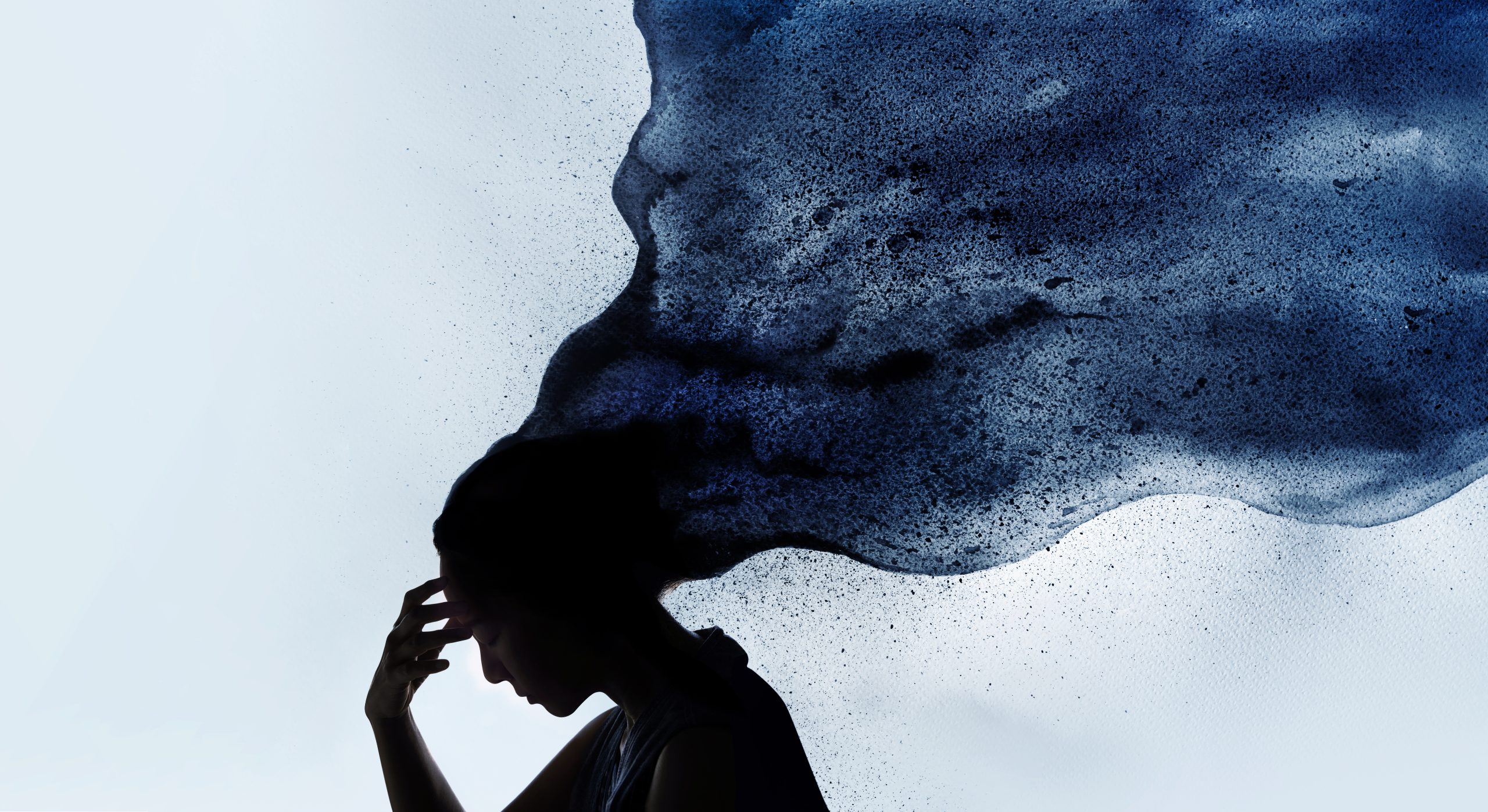 Mental Health Disorder Concept. Exhausted Depressed Female touch ilhouette of a woman holding her head as dark, inky clouds flow from her mind — an abstract visual representation of overwhelming thoughts, emotional burnout, and mental exhaustion caused by anxiety. Eleos Counselling in West Sussex offers support to help individuals untangle these invisible burdens through compassionate, one-to-one therapy.