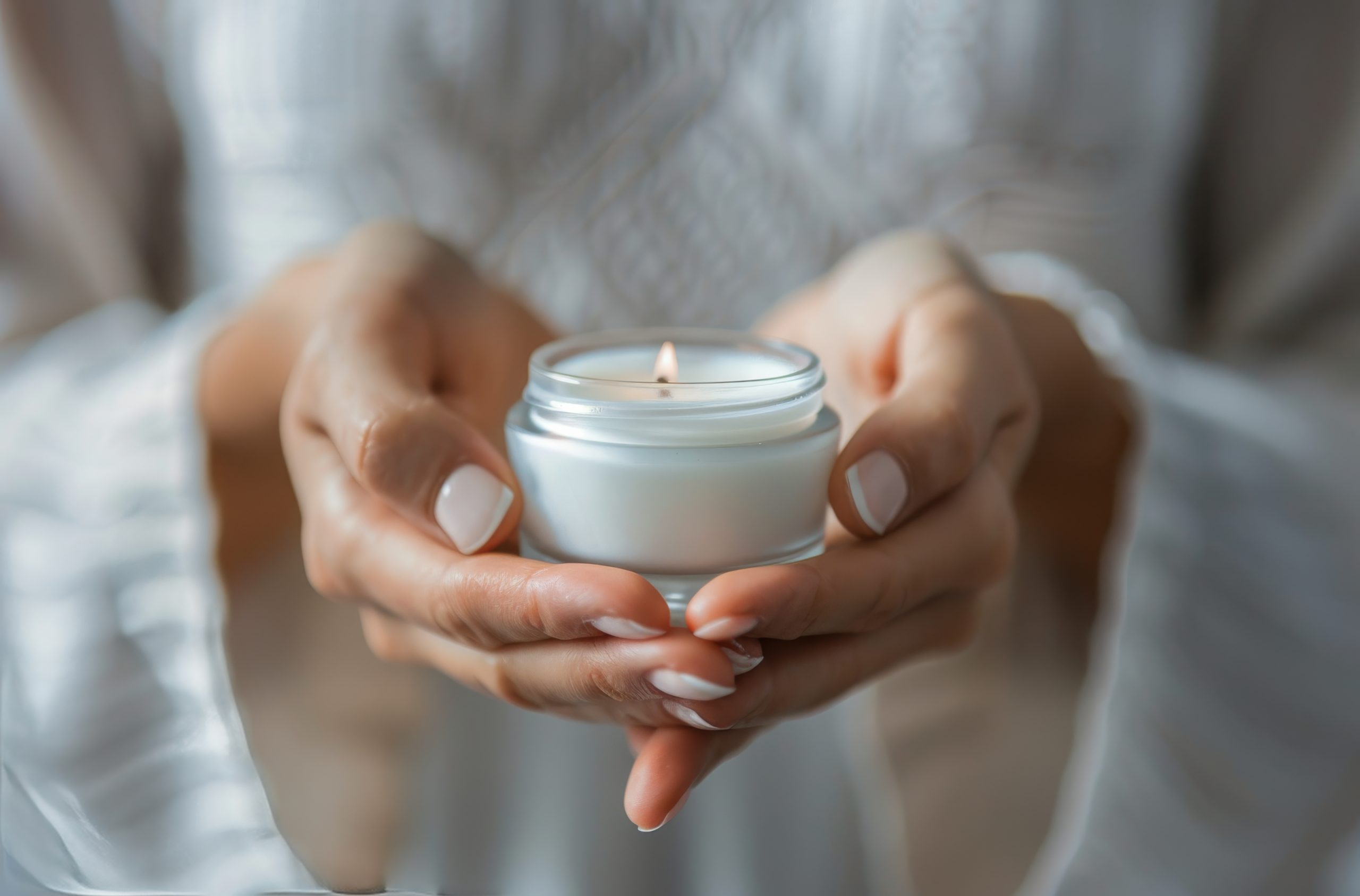 Woman holding a candle, Eleos Counselling homepage