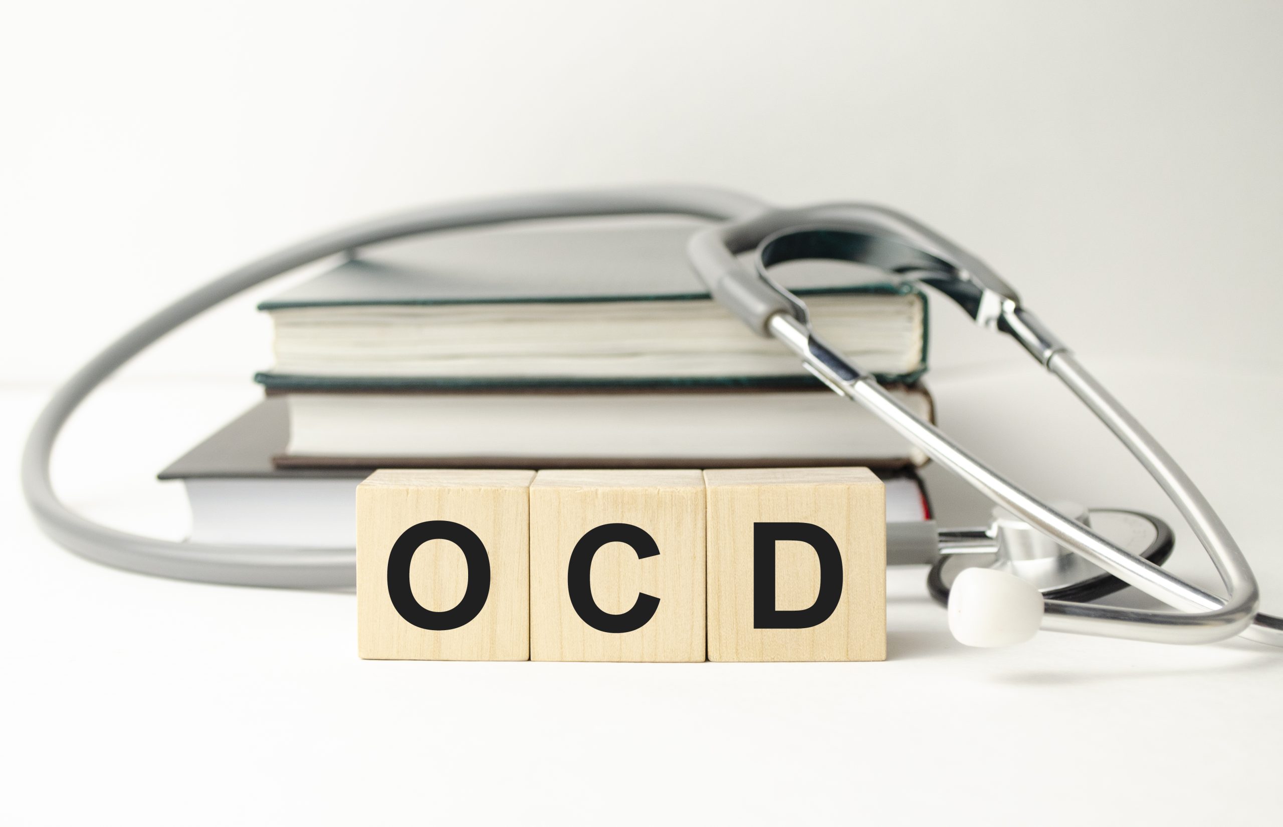 OCD Obsessive Compulsive Disorder text on wooden cube Counselling for obsessive compulsive disorder with Sussex